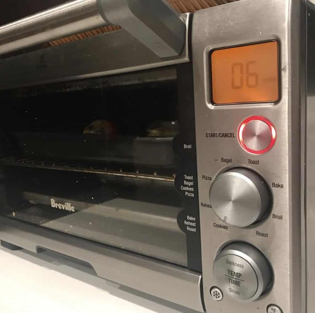 A STAINLESS steel space-saving toaster oven.
