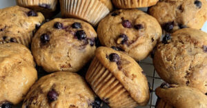 blueberry mini muffins made in one of the stainless steel pans