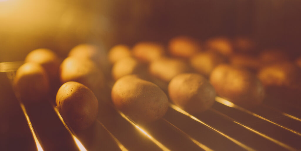 Whole potatoes in the peel baked in the hot toaster oven.