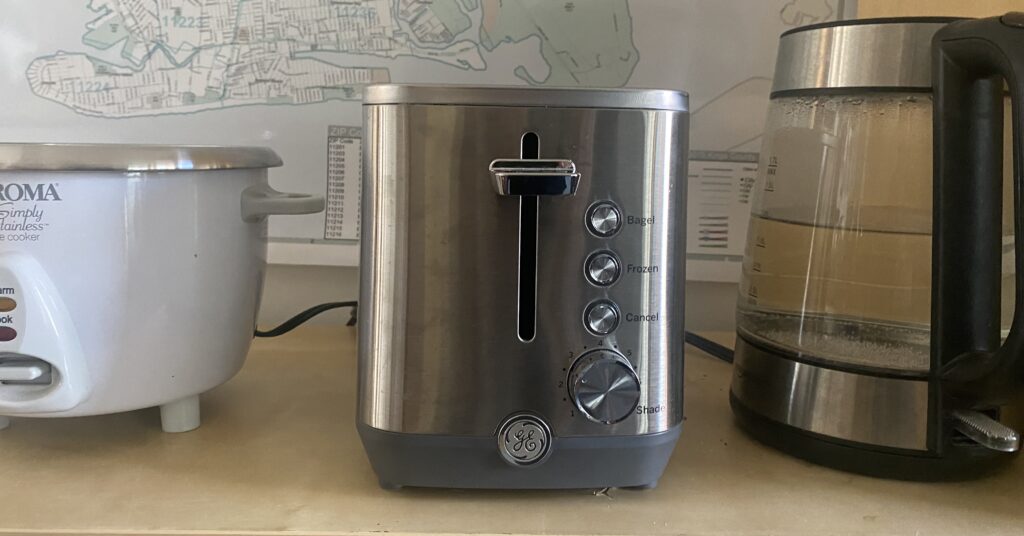 best compact toaster - GE toaster, next to a rice cooker and hot water heater